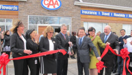 Taking part in the reopening ceremony for CAA Burlington are (left to right): Kathy Kelly, Director; Connie Macchione-Chauvet, Project Manager; Karen Vothknecht, Store Manager; Mayor Rick Goldring; Jay Woo, President and CEO; Ethel Taylor, Board Member; and Carlos Coutinho, COO.