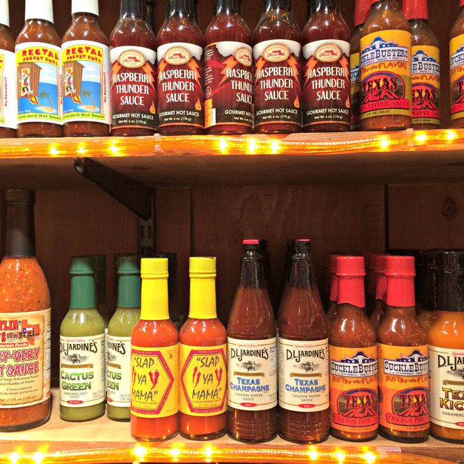 Get your hot sauce fix at Rustlin’ Robs Texas Gourmet Foods, from 100% Pain to Raspberry Thunder Sauce. Some are so hot you need to sign a release form before sampling them.