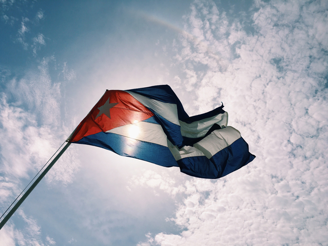 Cuban flag flying high above the Bay of Pigs Museum in Cienfuegos