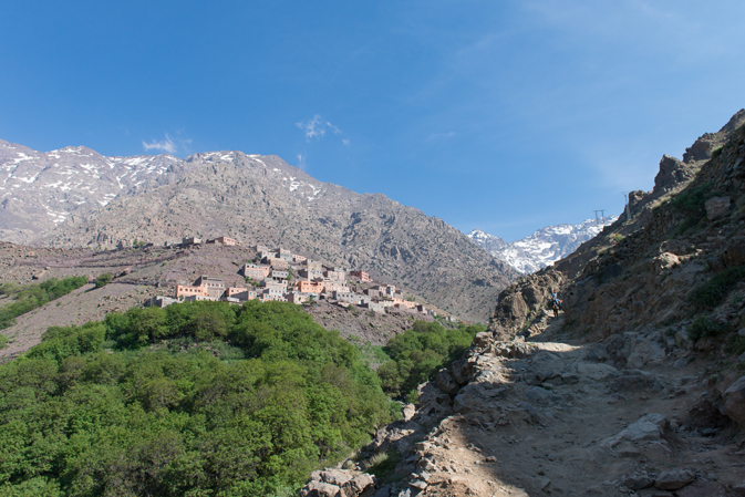 Hiking with overnight packs to the base of Toubkal, where the serious climb begins for experienced trekkers