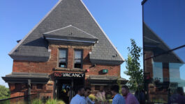 Rooftop drinks next to the 'No Vacancy' sign, where guests will find a private rooftop dining space