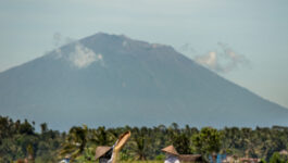 Bali volcano spews ash and cloud