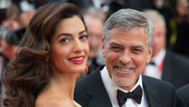 George Clooney boards flight with babies, hands out headphones to fellow passengers