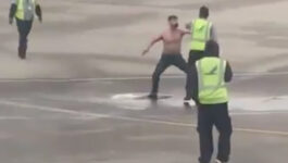 Caught on video: Drunk passenger throwing it down on airport tarmac