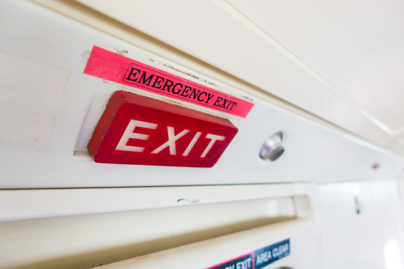 Plane passenger opens emergency door because it was “too stuffy and hot” inside