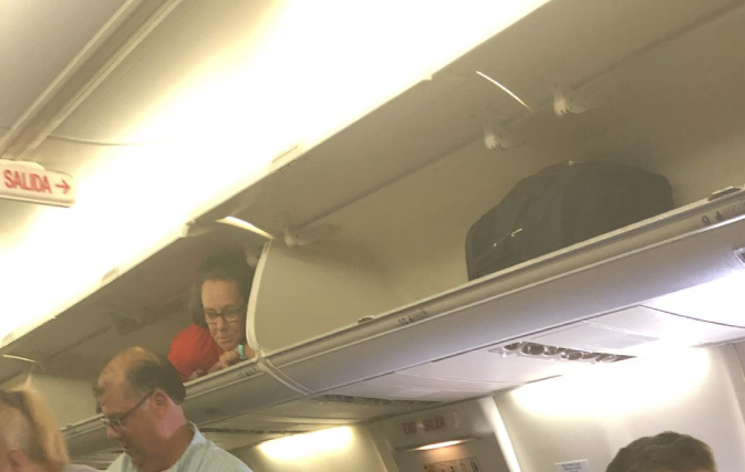 There’s a flight attendant in the overhead bin, no really - Travelweek