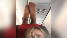 What-would-you-do-question-mark-Passenger-snaps-pic-of-dirty-feet-dangling-above-her-head